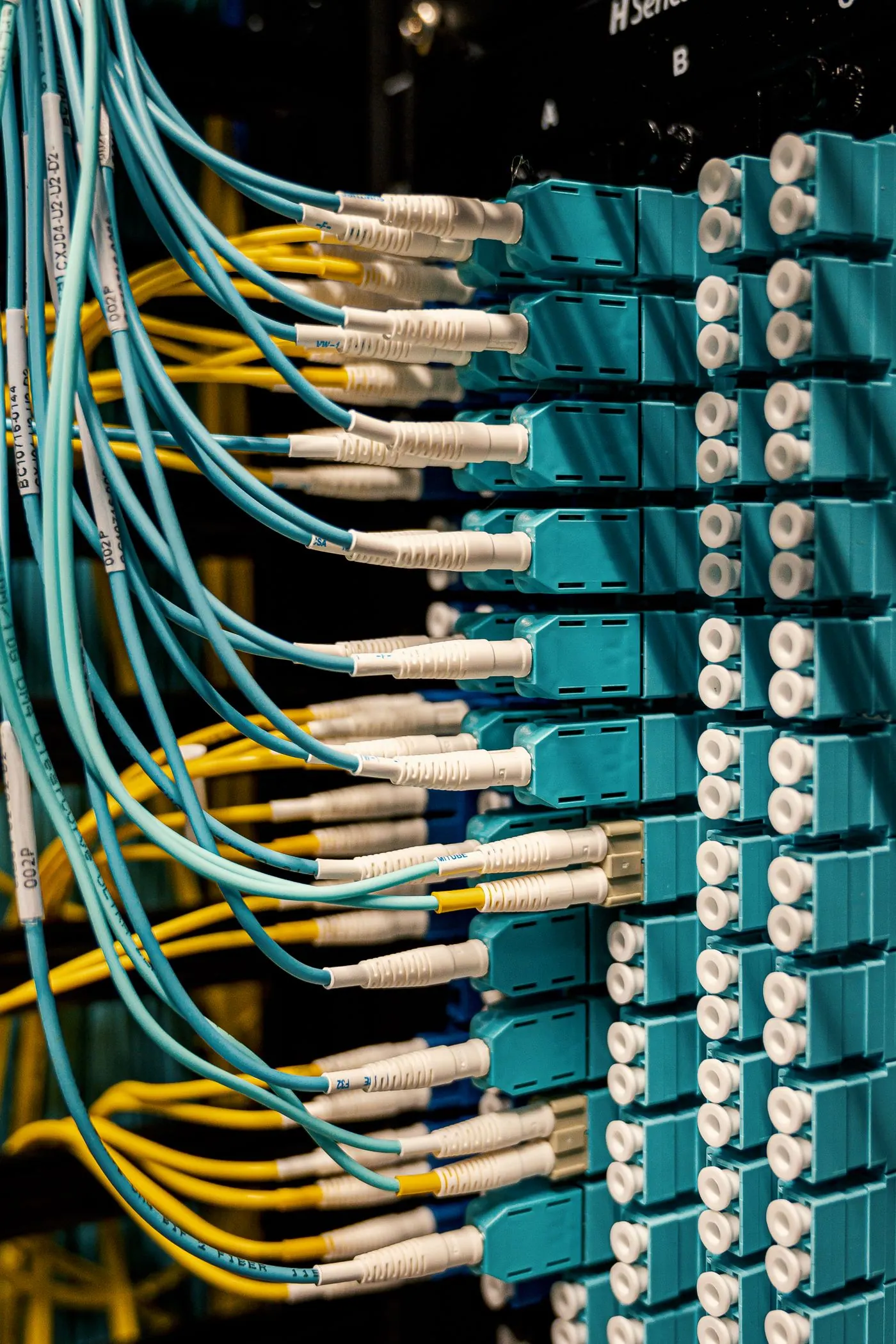 Telecommunications fiber switch hardware in a rack