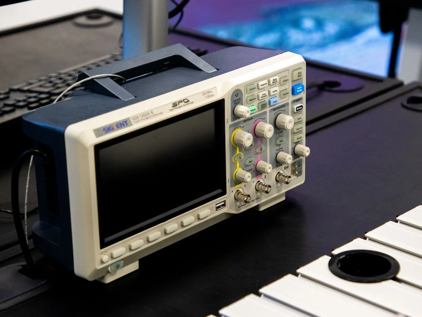 Oscilloscope displaying a signal trace during electrical diagnostics